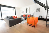Design armchair in aluminum and TPU Crystal Orange
