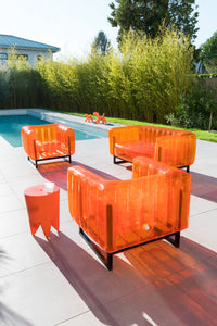 Design armchair in aluminum and TPU Crystal Orange