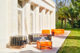 Design armchair in wood and TPU Crystal Orange